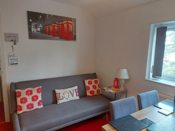 Lounge with sofa bed and countryside views